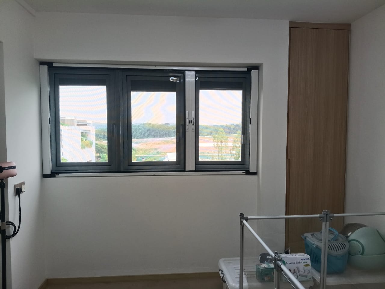 BlindXpert BX MultiPro Screen fitted around a multi-panel bedroom window in Singapore