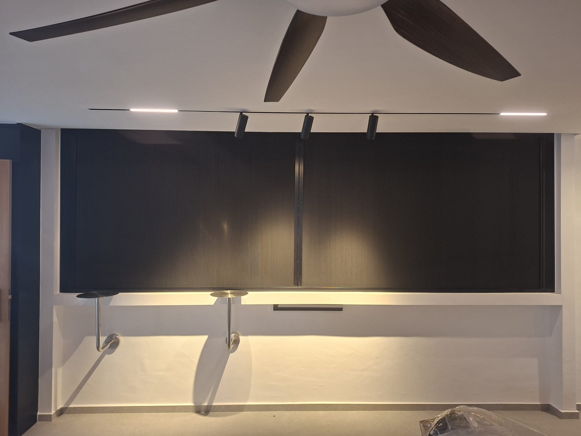 Folding mosquito screen installed on a compact window opening