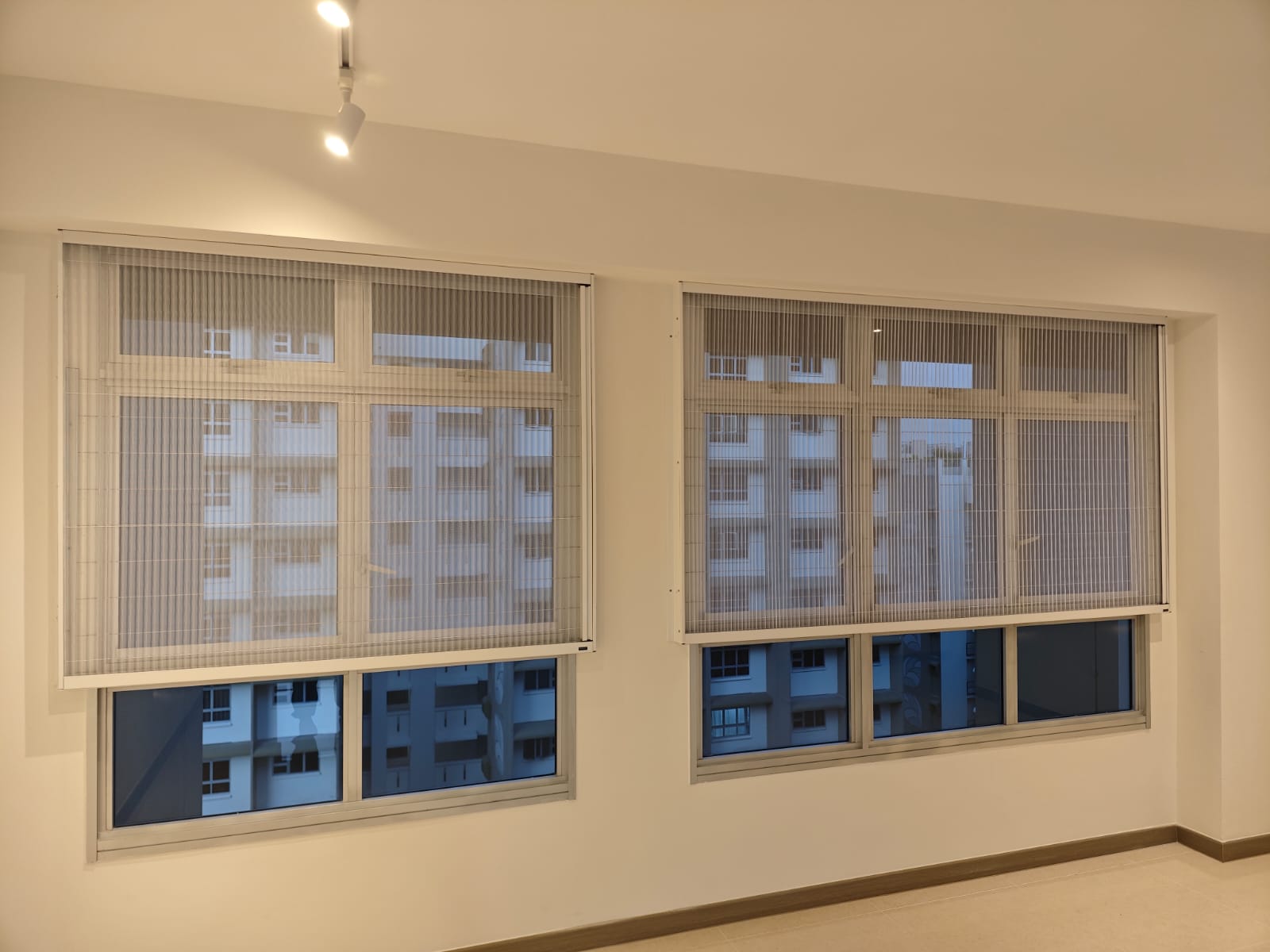 Custom multi-panel fit installed on a full-width living space